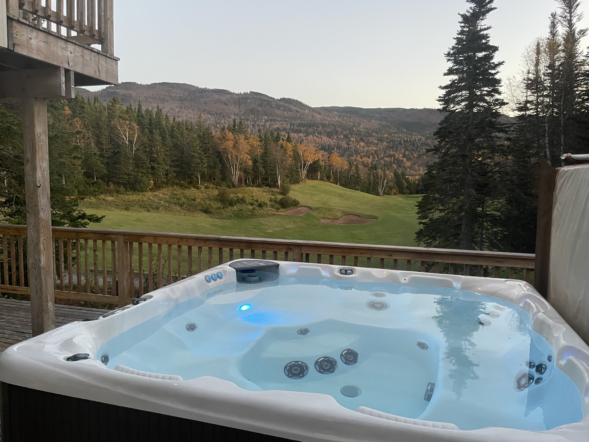 Private hot tub overlooking the fairway and wooded Humber Valley